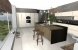 Kuchyňa spojená s obývačkou a krbom, pohľadový betón I PRUNUS kuchyne interiéry